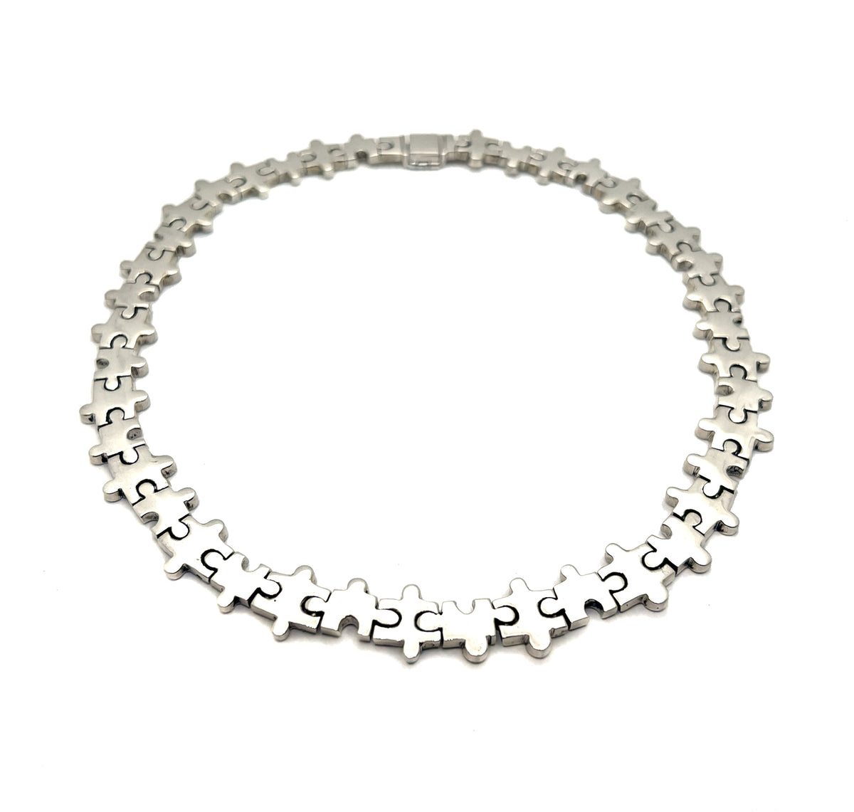 Sterling Silver Puzzle Motif Necklace + Bracelet