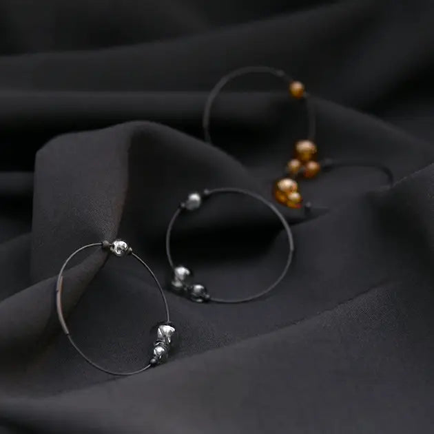 Boucles d'oreilles créoles Eclipse