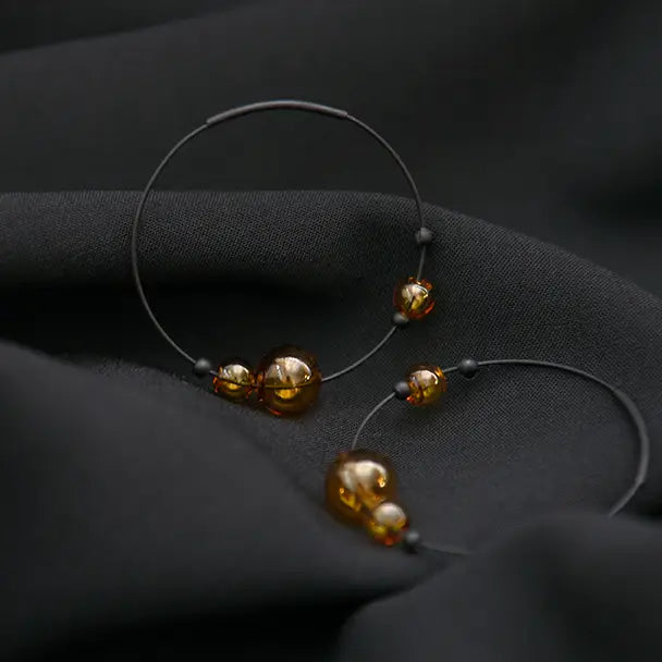 Boucles d'oreilles créoles Eclipse